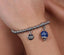 Bracciale Amo Capri 3571661 in metallo con campanella blu