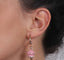 Orecchini Amo Capri 3511036 in metallo con campanella rosa e scritta capri rosè